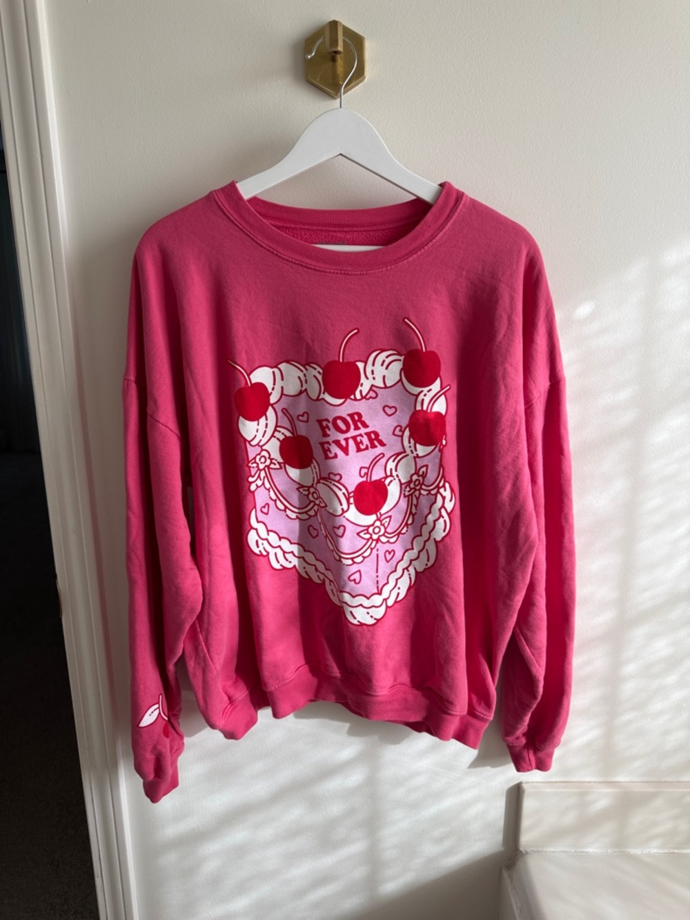 Women's Crewneck Sweatshirt in Bright Pink with Cherry Graphic